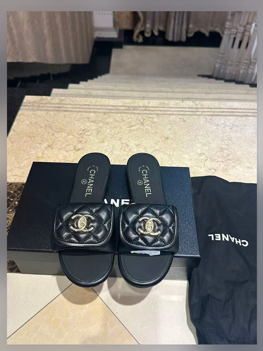 CHANEL Black Quilted CC Turnlock Slide Sandals